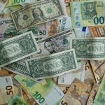 Pile of monetary bills in different currencies