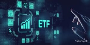 a monitor with an ETF sign and stock charts