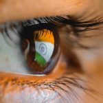 An illustration featuring the Indian flag, where a recent law threatens to change online gaming in the country forever.