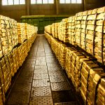 Thousands of gold bars in a storage facility